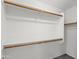 Large walk-in closet with double hanging rods at 8147 W Hilton Ave, Phoenix, AZ 85043