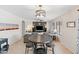 Casual dining area with round table and three stools at 8147 W Hilton Ave, Phoenix, AZ 85043