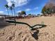 Sand play area with seesaw and playground equipment at 8147 W Hilton Ave, Phoenix, AZ 85043