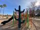 playground with cactus climber, slides, and swings at 8147 W Hilton Ave, Phoenix, AZ 85043