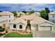 Single-story home with tile roof, and a two-car garage at 854 W Mesquite St, Gilbert, AZ 85233