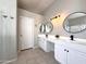 Modern bathroom with double vanity and round mirrors at 854 W Mesquite St, Gilbert, AZ 85233