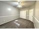 Bright bedroom featuring ceiling fan and double doors at 854 W Mesquite St, Gilbert, AZ 85233