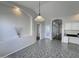 Bright kitchen with an island, white cabinets, and recessed lighting at 854 W Mesquite St, Gilbert, AZ 85233