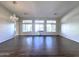 Elegant living room with hardwood floors and a chandelier at 854 W Mesquite St, Gilbert, AZ 85233