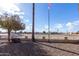 Landscaped backyard with view of a golf course at 9183 W Century Dr, Arizona City, AZ 85123