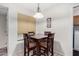 Small dining area with a four-person table and chairs at 9183 W Century Dr, Arizona City, AZ 85123