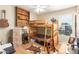 Bedroom featuring a wooden bunk bed, decor and natural light from a window at 11163 W Edgemont Ave, Avondale, AZ 85392