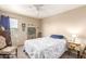 Bedroom showcasing natural light, ceiling fan, and stylish furnishings at 11163 W Edgemont Ave, Avondale, AZ 85392