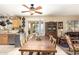 Bright dining area with backyard access and a view of the kitchen and living room at 11163 W Edgemont Ave, Avondale, AZ 85392