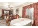 Traditional dining room featuring classic decor, a ceiling fan and lots of light at 11163 W Edgemont Ave, Avondale, AZ 85392