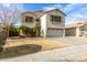 Charming two-story home with a well-maintained lawn and desert landscaping at 11163 W Edgemont Ave, Avondale, AZ 85392