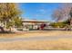 Community playground offering covered play area with swings, slides, and benches at 11163 W Edgemont Ave, Avondale, AZ 85392
