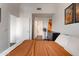 Spacious bedroom with orange bedding and en-suite bathroom at 1130 N 2Nd St # 313, Phoenix, AZ 85004