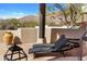 Relaxing patio with mountain views and lounge chairs at 12174 N 120Th St, Scottsdale, AZ 85259