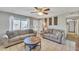 Living room featuring a comfortable sofa set and a rustic coffee table at 1243 E Susan Ln, Tempe, AZ 85288