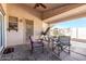 Covered patio with seating area and ceiling fan at 15990 N 90Th Ave, Peoria, AZ 85382