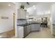 Modern kitchen featuring granite countertops and stainless steel appliances at 19751 N Desert Song Way, Surprise, AZ 85374