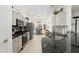 Spacious kitchen with granite countertops and stainless steel appliances at 19751 N Desert Song Way, Surprise, AZ 85374