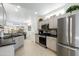 Sleek kitchen with granite countertops and stainless steel appliances at 19751 N Desert Song Way, Surprise, AZ 85374