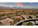 Aerial view of homes in a community with golf course views at 19771 N 84Th Way, Scottsdale, AZ 85255