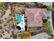 Aerial view of house with pool and landscaped backyard at 19771 N 84Th Way, Scottsdale, AZ 85255