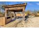 Community BBQ area with pergola, grill and lounge chairs at 19771 N 84Th Way, Scottsdale, AZ 85255