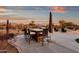 Outdoor kitchen and seating area with mountain views at 19771 N 84Th Way, Scottsdale, AZ 85255