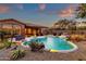 Luxury backyard with pool, patio, and outdoor kitchen at 19771 N 84Th Way, Scottsdale, AZ 85255