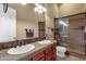 Bathroom with double vanity, large shower and tile at 19771 N 84Th Way, Scottsdale, AZ 85255
