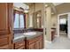Elegant bathroom with double sinks, a soaking tub, and a walk-in shower at 19771 N 84Th Way, Scottsdale, AZ 85255