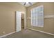 Bedroom with a closet and window shutters at 19771 N 84Th Way, Scottsdale, AZ 85255