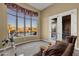 Relaxing Gathering room with a stunning view of the pool and mountains at 19771 N 84Th Way, Scottsdale, AZ 85255