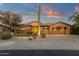 Stunning desert home with a three-car garage and mature landscaping at 19771 N 84Th Way, Scottsdale, AZ 85255