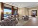 Spacious living room with mountain views and comfortable seating at 19771 N 84Th Way, Scottsdale, AZ 85255