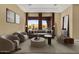 Bright living room featuring a large window with a scenic mountain view, stylish decor and recessed lighting at 19771 N 84Th Way, Scottsdale, AZ 85255