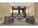 Spacious living room with comfortable seating and mountain views at 19771 N 84Th Way, Scottsdale, AZ 85255