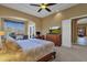 Large main bedroom with a king-size bed and stunning views at 19771 N 84Th Way, Scottsdale, AZ 85255