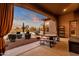 Covered patio with seating area and mountain views at 19771 N 84Th Way, Scottsdale, AZ 85255