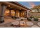 Covered patio with seating area and outdoor lighting at 19771 N 84Th Way, Scottsdale, AZ 85255