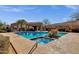 Community pool with spa and covered seating at 19771 N 84Th Way, Scottsdale, AZ 85255