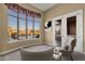 Comfortable sitting area with panoramic view of the pool and mountain landscape at 19771 N 84Th Way, Scottsdale, AZ 85255