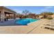 Relax by the community pool with lounge chairs at 19771 N 84Th Way, Scottsdale, AZ 85255