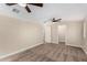 Bright bedroom featuring ceiling fan and ample closet space at 1983 E Don Carlos Ave, Tempe, AZ 85281