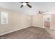 Spacious bedroom with neutral carpeting and ceiling fan at 1983 E Don Carlos Ave, Tempe, AZ 85281
