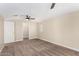 Well-lit bedroom with neutral wall paint and carpet at 1983 E Don Carlos Ave, Tempe, AZ 85281