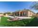 Landscaped backyard with fountain and patio at 22318 N 36Th St, Phoenix, AZ 85050