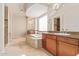 Spacious Primary bathroom with soaking tub, double sinks, and walk-in shower at 22318 N 36Th St, Phoenix, AZ 85050