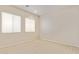 Spacious bedroom with large windows and neutral wall colors at 22318 N 36Th St, Phoenix, AZ 85050