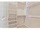 Well-organized closet with shelves and hanging rod at 22318 N 36Th St, Phoenix, AZ 85050